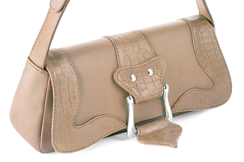 Handcrafted women's small luxurious elegant handbag in premium tan beige leather. Perfect for elevated everyday style.   
                Choose from our luxurious collections of leather and fabric to perfectly match your handbags to your outfits.